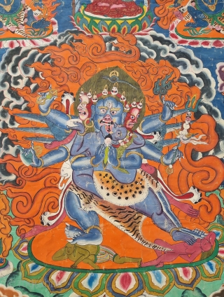 Thangka Shadbuja Mahakala From Tibet .
Distemper on cloth; recto with Tibetan inscriptions in gold identifying the various figures.

Shadbuja Mahakala is the principal protector deity of the Gelug school, indicated by the monks  ...