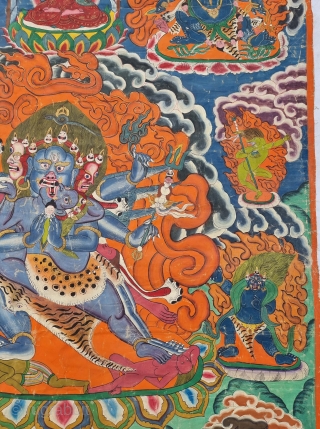 Thangka Shadbuja Mahakala From Tibet .
Distemper on cloth; recto with Tibetan inscriptions in gold identifying the various figures.

Shadbuja Mahakala is the principal protector deity of the Gelug school, indicated by the monks  ...