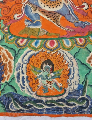 Thangka Shadbuja Mahakala From Tibet .
Distemper on cloth; recto with Tibetan inscriptions in gold identifying the various figures.

Shadbuja Mahakala is the principal protector deity of the Gelug school, indicated by the monks  ...