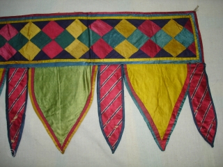 Patch work(Gajji-Silk)Toran from Kutch Gujarat India.This were Traditionally used mainly Jain Derasar Temples of Gujarat India.Backing with Manchester Print.C.1900.Its size is 30cmX102cm(DSC05704 New).          