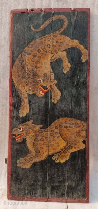 Dramatically Painted doors depicting symbols of Tibetan mythology such as Tigers Dragons and Lamas From Tibet. C.1875-1900. Its size. is 72cmX161cm (20221031_144434 ).          