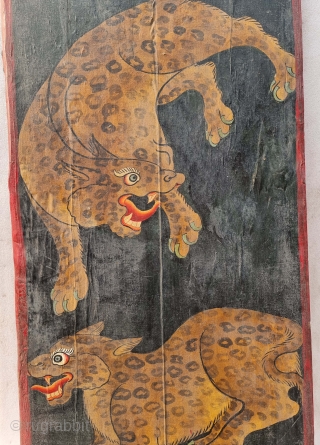 Dramatically Painted doors depicting symbols of Tibetan mythology such as Tigers Dragons and Lamas From Tibet. C.1875-1900. Its size. is 72cmX161cm (20221031_144434 ).          