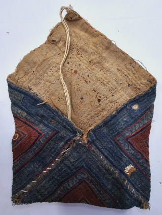 An Rare Indigo Blue Colour Ceremonial Banjara Dowry Bujki (Pouch) Bag.

From Karnataka, South India. India.

Embroidered on cotton.

C.1875 -1900

Its size is 18cmX16cm (20241109_173827).           