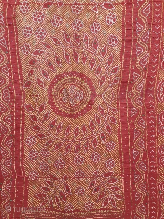 Ceremonial Tie and Dye Odhani known as Kumbhi,Tie and Dye Work with Badla work on the Gajji-Silk From Kutch Region of Gujarat, India. c.1900. Its size is 145cmX175cm. This were Traditionally used  ...