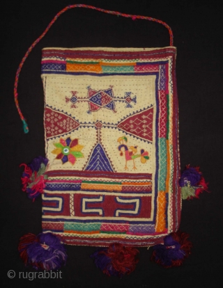 Embroidery Dowry Bag from Proper Chotila District of Saurashtra Gujarat India.Embroidery with wool on Cotton,From Rabari shepherd caste family.its size is 25cmX37cm(DSC03883 New).
          