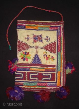 Embroidery Dowry Bag from Proper Chotila District of Saurashtra Gujarat India.Embroidery with wool on Cotton,From Rabari shepherd caste family.its size is 25cmX37cm(DSC03883 New).
          