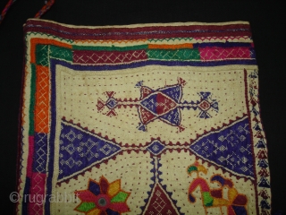 Embroidery Dowry Bag from Proper Chotila District of Saurashtra Gujarat India.Embroidery with wool on Cotton,From Rabari shepherd caste family.its size is 25cmX37cm(DSC03883 New).
          