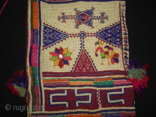 Embroidery Dowry Bag from Proper Chotila District of Saurashtra Gujarat India.Embroidery with wool on Cotton,From Rabari shepherd caste family.its size is 25cmX37cm(DSC03883 New).
          