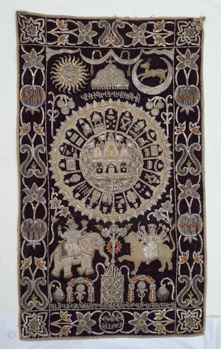 Jain Temple Hanging, Patan Gujarat, India. C.1900. Silver and gold gilt embroidery Cotton-Velvet. Its size is 77cmX123cm.   
This a holy piece, showing the Sun and Moon with twenty different marks  ...