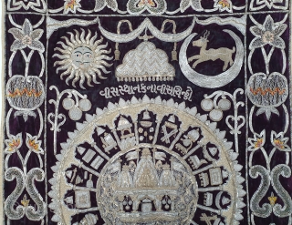 Jain Temple Hanging, Patan Gujarat, India. C.1900. Silver and gold gilt embroidery Cotton-Velvet. Its size is 77cmX123cm.   
This a holy piece, showing the Sun and Moon with twenty different marks  ...