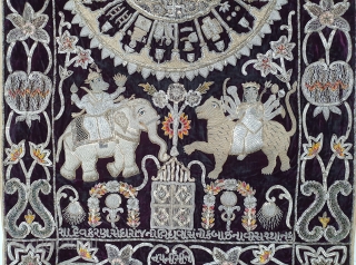 Jain Temple Hanging, Patan Gujarat, India. C.1900. Silver and gold gilt embroidery Cotton-Velvet. Its size is 77cmX123cm.   
This a holy piece, showing the Sun and Moon with twenty different marks  ...