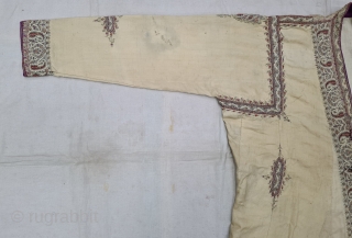 An Rare Kashmir Bunara Kani Work Choga (Coat) Borders with Keri butis, From Kashmir, India. India. There are imitation pockets in the front and similar motifs on the sleeves, The back and  ...
