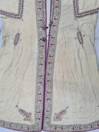 An Rare Kashmir Bunara Kani Work Choga (Coat) Borders with Keri butis, From Kashmir, India. India. There are imitation pockets in the front and similar motifs on the sleeves, The back and  ...