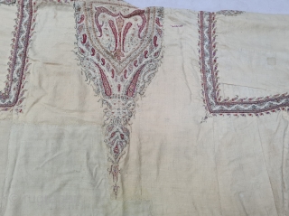 An Rare Kashmir Bunara Kani Work Choga (Coat) Borders with Keri butis, From Kashmir, India. India. There are imitation pockets in the front and similar motifs on the sleeves, The back and  ...