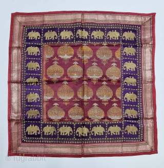 Unusual Temple Hanging Zari Brocade (Real Zari) with Fine Kalabattu Embroidery Elephant Design Border (Real Zari Thread) From Jamnagar Gujarat India. India.

C.1875-1900.

Its size is 98cmX98cm(20221122_141511).        