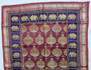 Unusual Temple Hanging Zari Brocade (Real Zari) with Fine Kalabattu Embroidery Elephant Design Border (Real Zari Thread) From Jamnagar Gujarat India. India.

C.1875-1900.

Its size is 98cmX98cm(20221122_141511).        