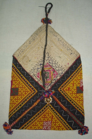 Dowry Bag(Bhujki),Mahar group,From Jaisalmer District of Rajasthan.India.Cotton embroidered with silk and cotton,mirrors,cotton tassels and string.H.30cm,W.20cm(DSC05959 New).                 