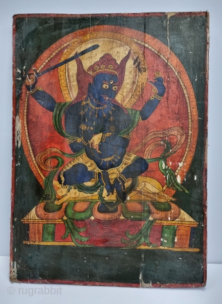 Dramatically Tibetan Buddhist Hand Painted Wood Panel depicting symbols of Tibetan mythology such as Tigers Dragons and Lamas From Tibet. c.1875-1900. 

Its size is 58cmX80cm (20221211_163946).       