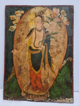 Dramatically Tibetan Buddhist Hand Painted Wood Panel depicting symbols of Tibetan mythology such as Tigers Dragons and Lamas From Tibet. c.1875-1900. 
Its size is 58cmX80cm (20221211_164055).       