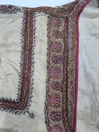 An Kashmir Embroidery Choga (Coat) Borders with Keri butis, From Kashmir, India. India. 

There are imitation pockets in the front and similar motifs on the sleeves, The back and Shoulders are Decorated  ...