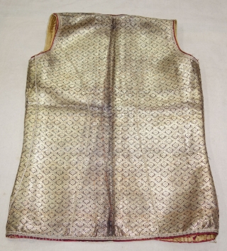 Boys Waistcoat(sadri or Jacket), Zari Brocade (Gold Plated Real Silver Threads) On Gajji-Silk,
Worn by Royal Vohra Muslims Community Of Sidhpur,Patan, Gujarat. India.

C.1875. 

L-54cm,W-38cm(DSC09622).          
