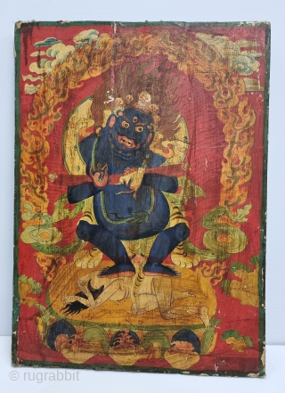 Dramatically Tibetan Buddhist Hand Painted Wood Panel depicting symbols of Tibetan mythology such as Tigers Dragons and Lamas From Tibet.

 c.1875-1900. 

Its size is 59cmX82cm (20221211_163615).       