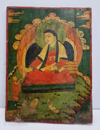 Dramatically Tibetan Buddhist Hand Painted Wood Panel depicting symbols of Tibetan mythology such as Tigers Dragons and Lamas From Tibet. c.1875-1900. Its size is 50cmX67cm (20221211_164305).       