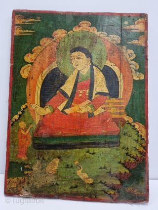 Dramatically Tibetan Buddhist Hand Painted Wood Panel depicting symbols of Tibetan mythology such as Tigers Dragons and Lamas From Tibet. c.1875-1900. Its size is 50cmX67cm (20221211_164305).       