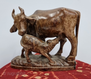 Very Unique Wooden Kamadhenu Cow,  the wish fulfilling cow of plenty with her calf. From Maharashtra.India.
According to the Puranas all the cattle in the world are descended from Kamadhenu, also called  ...