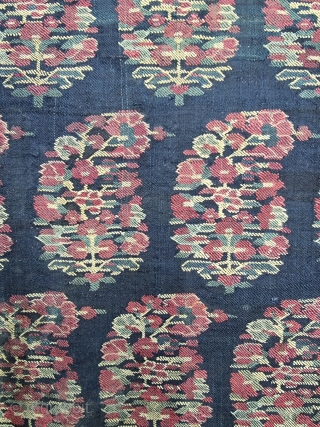 An Unique And Rare Indigo Blue Ground Color, Jaipuri Kani Jamawar Fragment From Kashmir, India.

C.1810-1825.

Its Size is 77cmx107cm.

Butas size is 6cmX9cm (20231222_130239).           