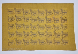 Pichwai Fragment for the Gopashtami From Gujarat India. Silver-tinsel Stamped with gum on Yellow Muslin cotton.

Circa 1875-1900.

Its size is 50cmX80cm  (20231226_142039).           