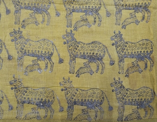 Pichwai Fragment for the Gopashtami From Gujarat India. Silver-tinsel Stamped with gum on Yellow Muslin cotton.

Circa 1875-1900.

Its size is 50cmX80cm  (20231226_142039).           