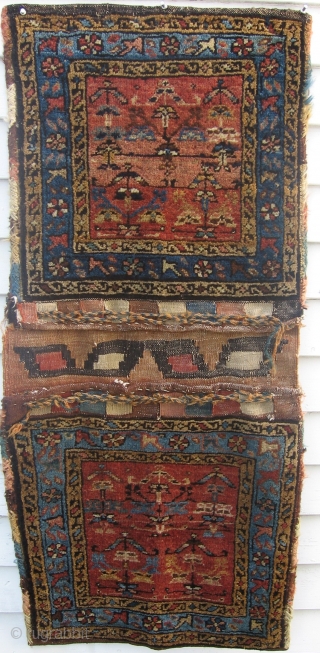 A very nice complete pair of Ca. 1920 Northwest Persian bags, 21 1/2" x 47 1/2". Slight moth nibbles at one end in full pile. One funky green kilim loop slit --all  ...