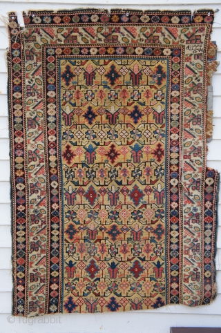Kuba large section fragment dated 1230 AH (1816 AD), 40" x 38". This example uses a Hamadan border motif which I have never seen in any Caucasian rug before.  The colors  ...