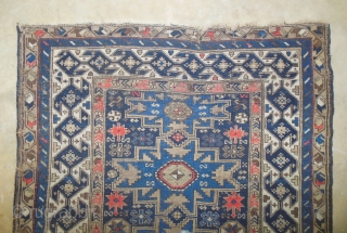 Early 20th Century Lesghi Star Caucasian 3'11" x 5'3." Lovely blue colors and mix of natural and some synthetic dyes, but no color run. Very interesting and unusal major border. Wear and  ...