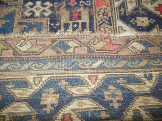 Early 20th Century Lesghi Star Caucasian 3'11" x 5'3." Lovely blue colors and mix of natural and some synthetic dyes, but no color run. Very interesting and unusal major border. Wear and  ...