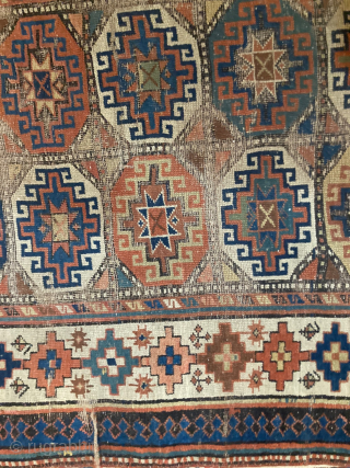 Antique Moghan Kazak 4' x 10'10" has surface wear but is structurally sound. For inquiries contact me directly at l_g_gerber@yahoo.com.