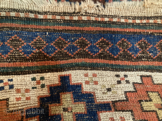 Antique Moghan Kazak 4' x 10'10" has surface wear but is structurally sound. For inquiries contact me directly at l_g_gerber@yahoo.com.