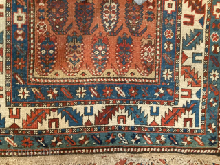 Antique Caucasian with boteh design (possibly Kurdish) 3'8" x 10'5" with one bite out of the side and wear commensurate with age.           