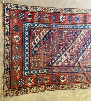 Antique Caucasian Gendje 3'5" x 8'10". Obvious wear and old repairs but still has excellent colors. Contact me directly at l_g_gerber@yahoo.com.  POR          