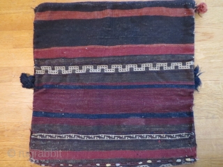 Perhaps not antique but a very nice Baluch bag with good colours and condition.                   