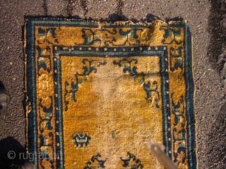 Small abused late 18th. c. Ningxia rug, it has glue on the back, nice colours.                  