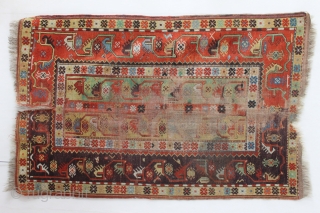 Antique Melas rug, 155x99 cm. good colours and a very nice old looking border. A lot of wear in the center, a dark spot and a 20 cm. long slit at the  ...