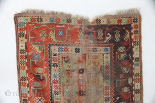 Antique Melas rug, 155x99 cm. good colours and a very nice old looking border. A lot of wear in the center, a dark spot and a 20 cm. long slit at the  ...