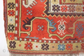 Antique Melas rug, 155x99 cm. good colours and a very nice old looking border. A lot of wear in the center, a dark spot and a 20 cm. long slit at the  ...