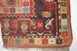 Antique Melas rug, 155x99 cm. good colours and a very nice old looking border. A lot of wear in the center, a dark spot and a 20 cm. long slit at the  ...