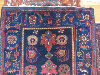 Perhaps a Feridan rug, in dozar size, made about 1930. OK condition with just some wear and nice colours.              