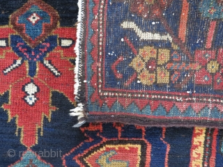 Perhaps a Feridan rug, in dozar size, made about 1930. OK condition with just some wear and nice colours.              