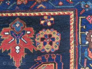 Perhaps a Feridan rug, in dozar size, made about 1930. OK condition with just some wear and nice colours.              