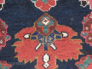 Perhaps a Feridan rug, in dozar size, made about 1930. OK condition with just some wear and nice colours.              